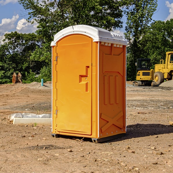 how often are the porta potties cleaned and serviced during a rental period in Banco